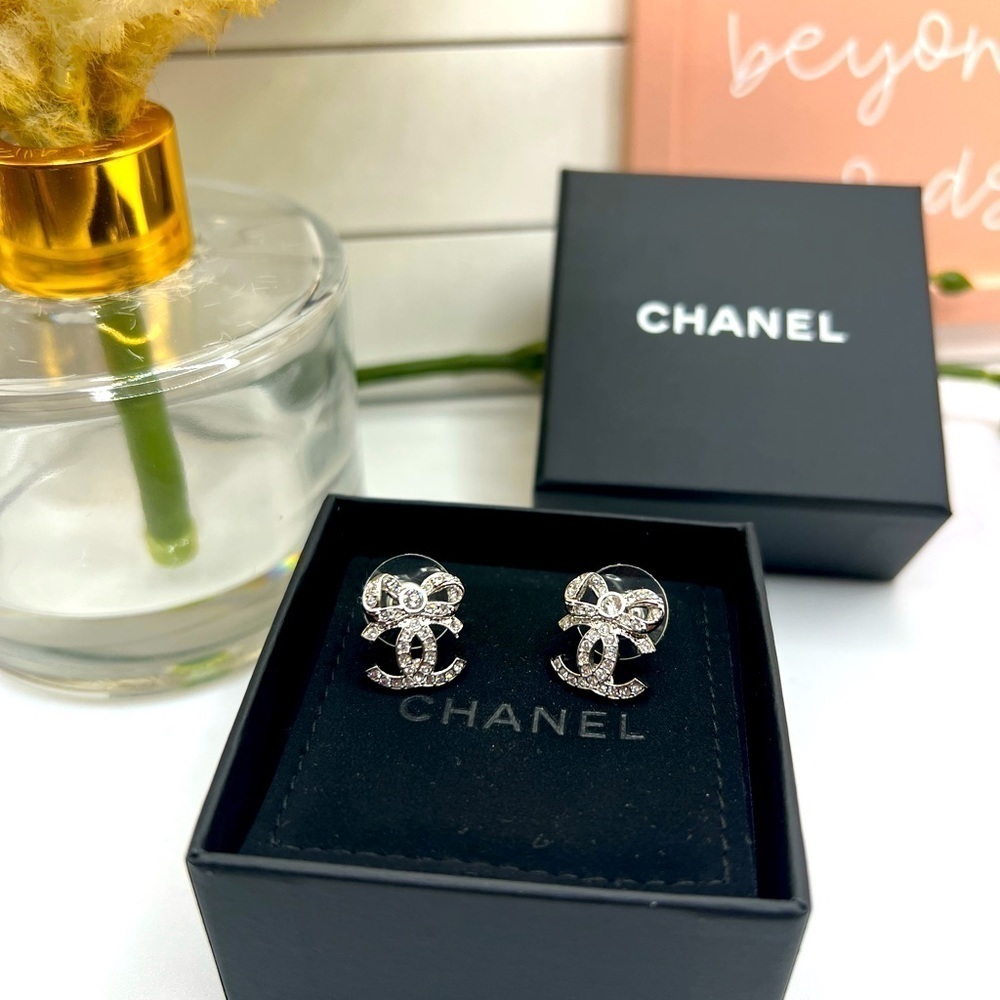 CHANEL Silver CC Crystal Ribbon Bow Earrings